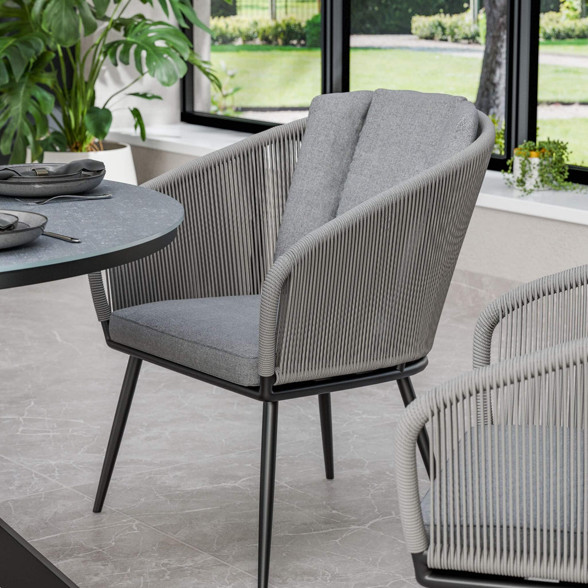 Dusklia - Aspen Outdoor 4 Seater Round Dining Table and Chairs - Grey