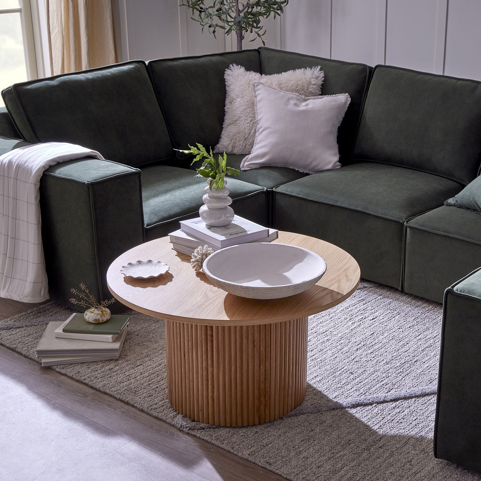 Dusklia - Hattie Round Pedestal Coffee Table - Light Wood