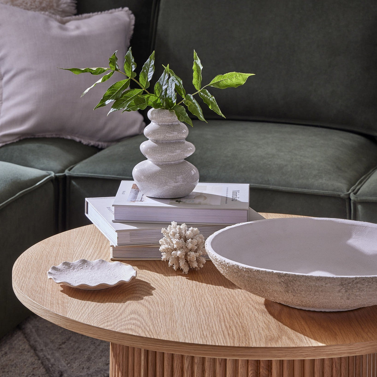 Dusklia - Hattie Round Pedestal Coffee Table - Light Wood