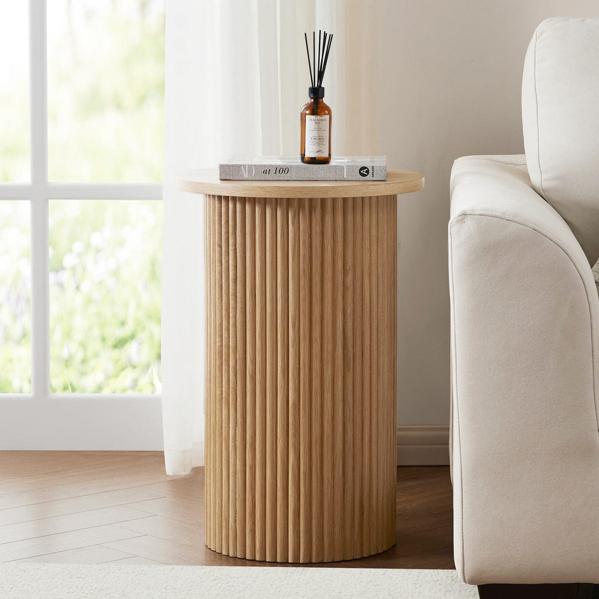 Dusklia - Hattie Round Pedestal Side Table - Light Wood