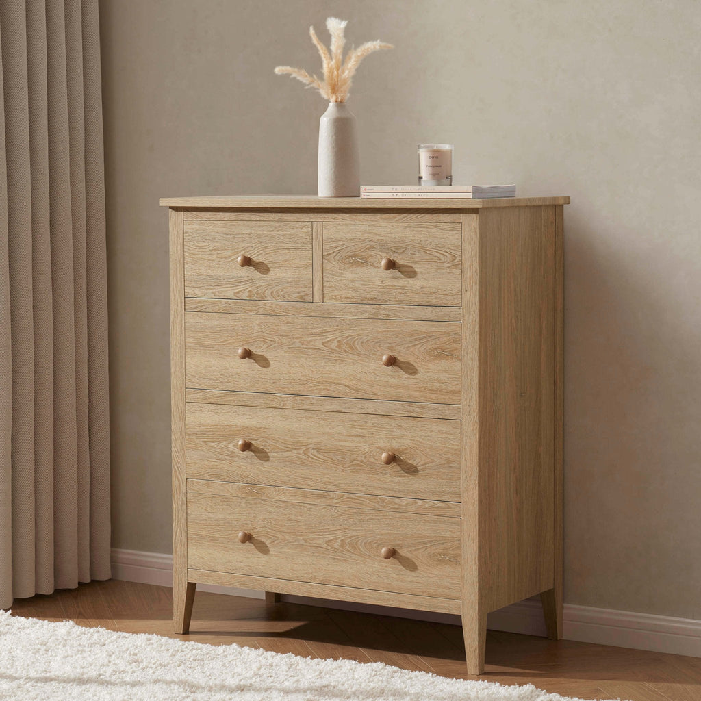 Dusklia - Nell 5 Drawer Chest - Light Wood