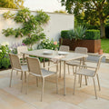 Dusklia - Porto Outdoor 6 Seater Rectangular Dining Table and Stacking Chairs - Champagne
